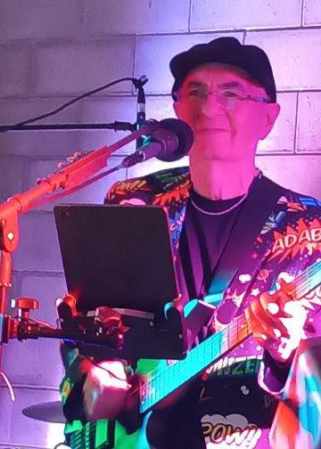Simon — Lead Guitar & Vocals